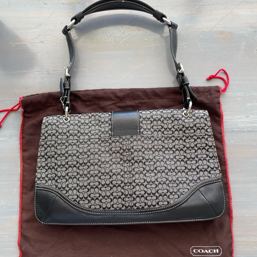 Authentic Coach handbag in classic black logo print & black leather w/ silver
